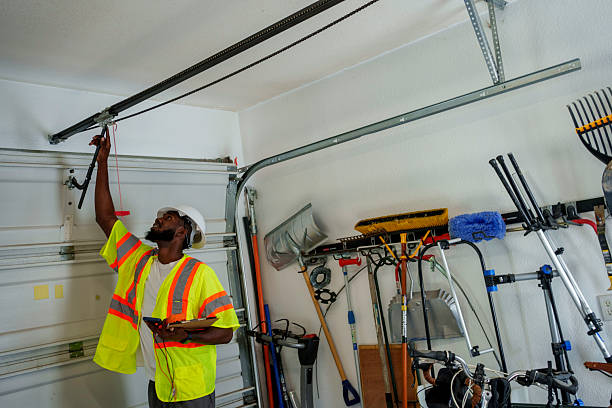 Professional Garage Door Roller Replacement technician working in Bluffton, OH